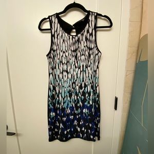 Front has the blue, white, black pattern and back is full black